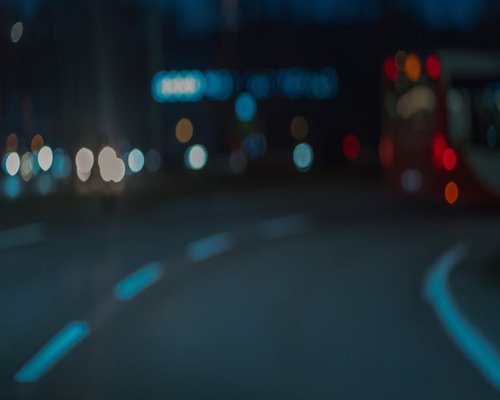 Evening traffic lights blurred in the city